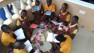 Children studying after school at one of our transition houses